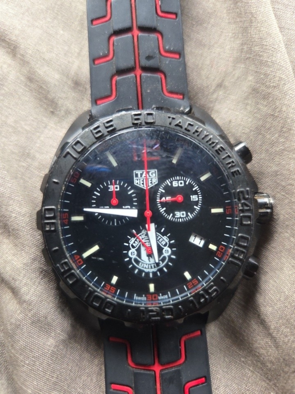 TAG Heuer Black Dial Chronograph Watch with Red Accents